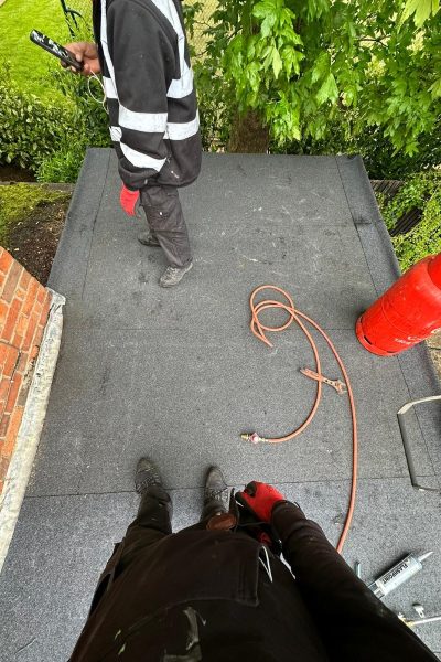 Flat roof being repaired in Agher